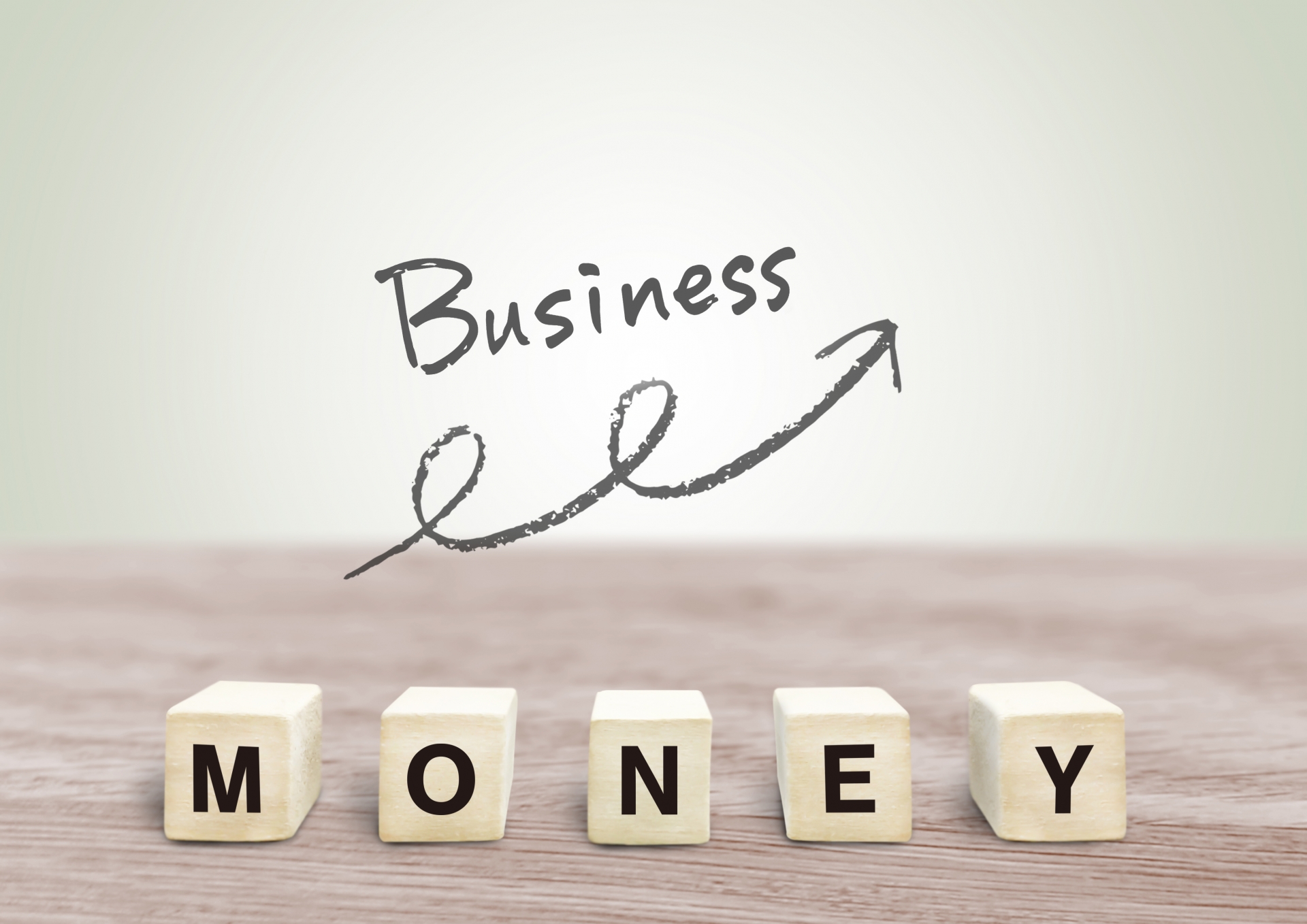 「MONEY」のブロックと「Business」の文字